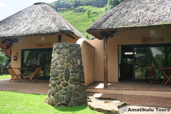 Thatched two-bed interleading garden-view chalet with stone exterior at Giant’s Castle